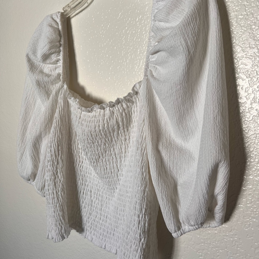 Ballon sleeved smocked white blouse